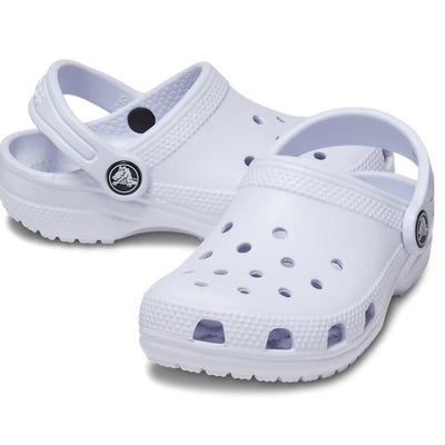 A pair of Crocs Kids - Classic Clog Dreamscape Purple for toddlers, featuring ventilation holes and adjustable heel straps, displayed on a plain white background.