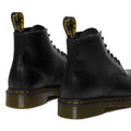 a rear, heel shot of a pare of Dr Martens 101 6 eye boots in black. Shows pull tab on heel and stitching re enforcing on the heel.,
190665350715,
190665350722,
190665350739,
190665350746,
190665350753,
190665350760,
190665350777,
190665350784,
190665350791,
190665350807,
190665350814,