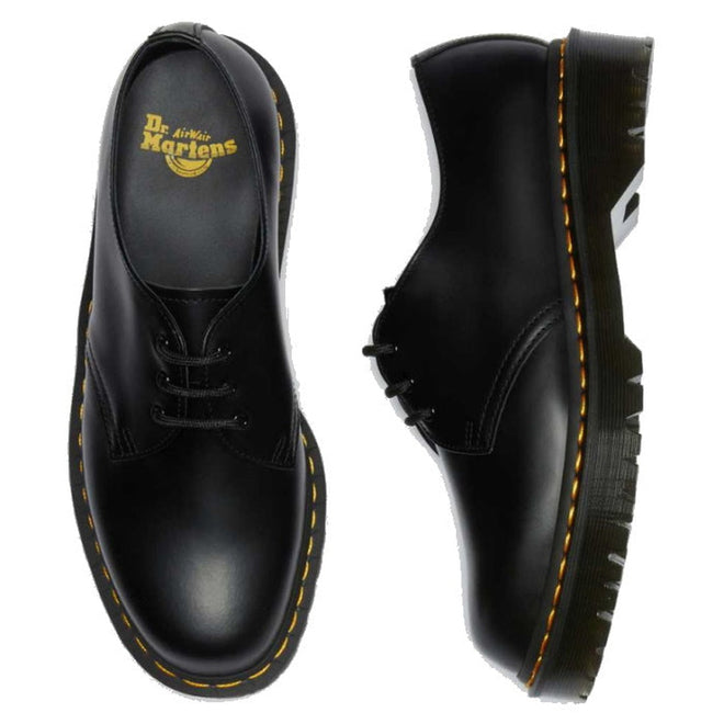 right foot top down view and left foot outer side view of black leather dr martens 1461 3 eyelet shoes aith the bes sole,
883985883604,
883985883611,
883985883628,
883985883635,
883985883642,
883985883659,
883985883666,
883985883673,
883985883680,
883985883697,
883985883703,
883985883710,
883985883727,
883985883734,
883985883741,
883985883765,