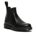 Image of right foot, side on of Dr Martens 2976 Mono Black Chelsea Boot Smooth Leather-Foot Forward Shoes