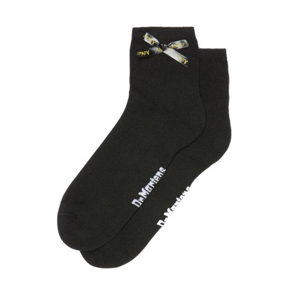 Image of right foot, side on of Dr Martens Bow Short Socks for Boots or Shoes-Foot Forward Shoes