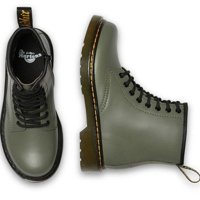 A pair of Dr Martens kids 1460 J Juniors Leather Boot w/zip in khaki, shown from top and side views, features black laces, yellow stitching, Goodyear-welted soles, a zipper, and a back pull tab., 27368, 27369, 190665488746, 190665488753, 190665488654, 190665488678, 190665488692