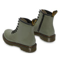A pair of Dr Martens kids 1460 J Juniors Leather Boot w/zip in khaki, featuring black soles, yellow stitching, black side zippers, and branded black pull tabs. The Goodyear-welted boots are shown angled to display the front and back., 27368, 27369, 190665488746, 190665488753, 190665488654, 190665488678, 190665488692