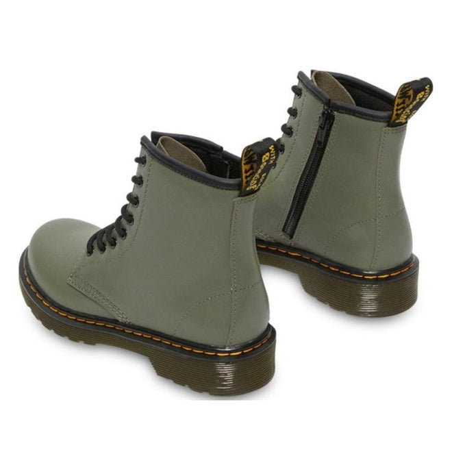 A pair of Dr Martens kids 1460 J Juniors Leather Boot w/zip in khaki, featuring black soles, yellow stitching, black side zippers, and branded black pull tabs. The Goodyear-welted boots are shown angled to display the front and back., 27368, 27369, 190665488746, 190665488753, 190665488654, 190665488678, 190665488692