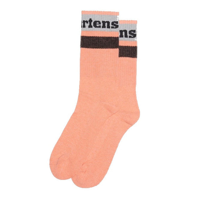 Image of right foot, side on of Dr Martens Organic Socks Athletic Logo Beige-Foot Forward Shoes