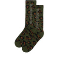 Image of right foot, side on of Dr Martens Socks Vertical Logo Unisex Camo Khaki-Foot Forward Shoes
