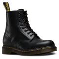 Right foot of dr martens 1460 boot in firmer smooth leather with a slight shin. An all balck boot with 8 sets of eyelets commonly referred to as an  8 up. Yellow stitching where the soles and uppers meet 800090828511, 800090828535, 800090828542,800090828559.800090828566,800090796377,800090796391