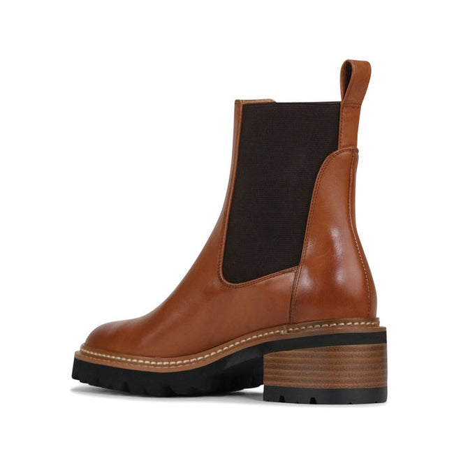 29612,
29613,
29614,
29615,
29616,
29617,

EOS Linear women’s boot in Brandy leather with side gussets, block heel, and lugged sole. Side View of Right Foot taken from the heel showing heel detailing on the inside of the leg, 29612, 29613, 29614, 29615, 29616, 29617