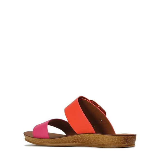 The Los Cabos Doti Pink/Orange Light Flexible Sandal features a cork-like sole and two wide straps—pink over the toes, orange over the midfoot—shown in side profile on a white background., 9321191058962, 9321191058979, 9321191058986, 9321191058993, 9321191059006, 9321191059013, 9321191059020