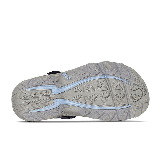 The image shows the gray, textured sole of the Teva Boys Active Rugged Sandal K Tanza Blue, featuring geometric tread patterns and light blue accent lines running along its length., 194715413832, 194715413887, 194715413856, 194715413801, 194715413818, 194715413825, 194715413894, 194715413931, 194715413948, 194715413924