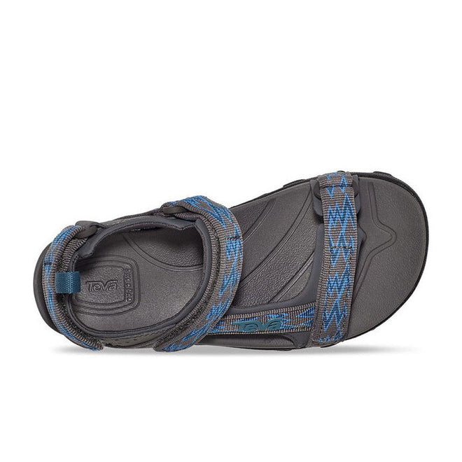 Top view of a Teva Boys Active Rugged Sandal K Tanza Grey CLEARANCE: single dark grey sport sandal with blue patterned recycled polyester straps, hook-and-loop closure, and Teva logo on footbed and side—ideal playground sandals., 24616, 195719344092, 195719344108, 24610, 24611, 24612, 195719344139, 195719344177, 195719344184, 195719344160